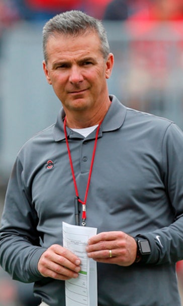 The Latest: Ohio State to open camp with Meyer on leave